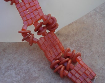 Orange Rollin' Rollin' Bracelet... vintage bakelite discs