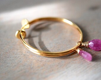 Gold clip on hoops with pink sapphire drops