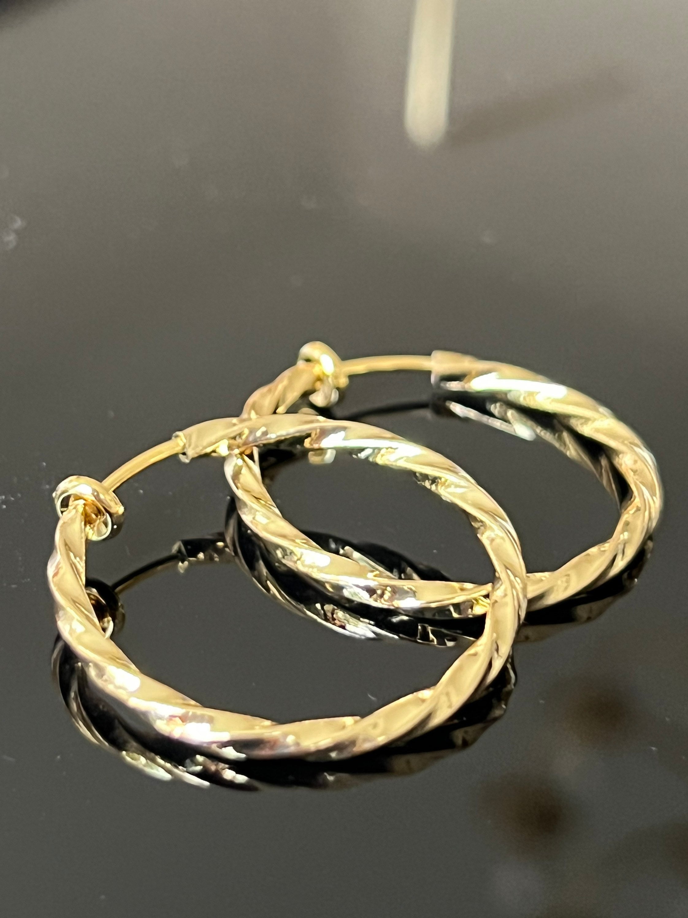 Clip su orecchini - Placcato oro cerchi intrecciati - Dhana