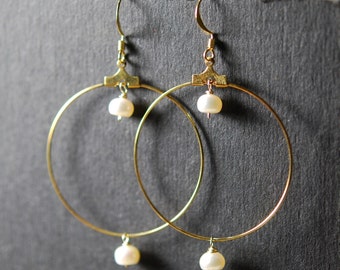 Aros nacarados bañados en oro
