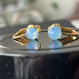 Clip on stud earrings - Swarovski air blue opal - gold
