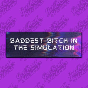 May include: A black and white sticker with a glitchy, pixelated design. The text on the sticker reads "Baddest Bitch in the Simulation".