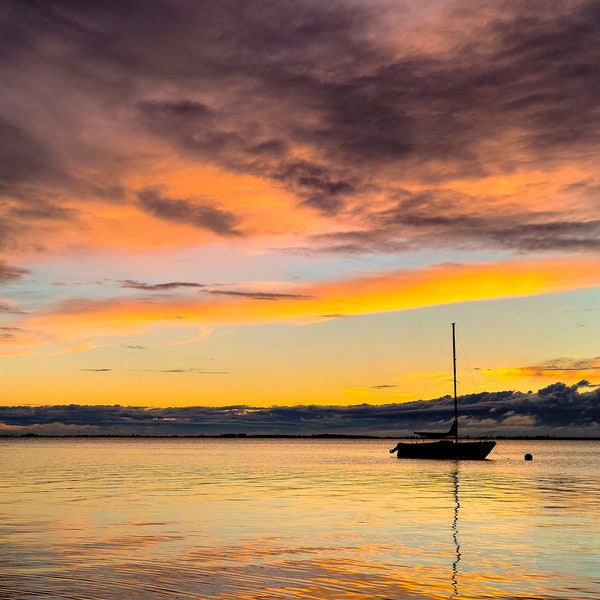 Colourful sunset on calm pacific waters, perfect wall art for your home, Airbnb, room, living area or even your Desktop.