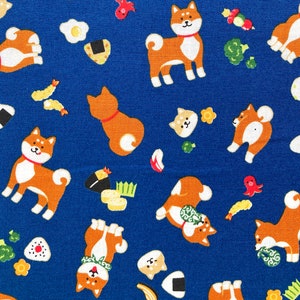 Shiba Inu and Onigiri (rice balls) on blue background, Japanese cotton fabric, sold by the 1/2 yard,