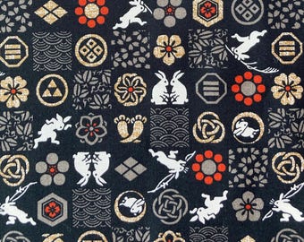White rabbit and Japanese motif on black background, Japanese cotton fabric, sold by the half yard,