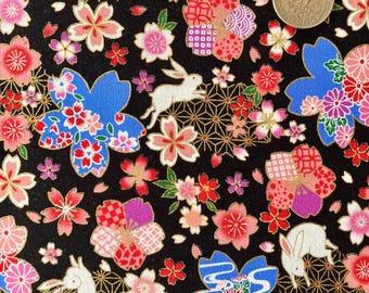 Rabbits and cherry blossoms on black background, Japanese cotton fabric, sold by the half yard,