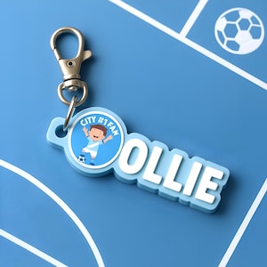 Personalised Sky Blue & White Football Keyring – Custom Manchester Name Keychain Gift for Football Fans, Birthday or Christmas Present