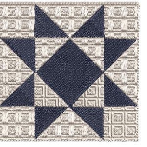 May include: A square quilt block featuring a navy blue star design set against a patterned background of beige and white squares. The star is composed of triangles and a central diamond shape, all in navy blue.