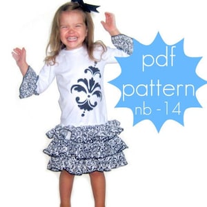 May include: A white dress with long sleeves and a tiered skirt. The dress has a black and white floral pattern on the skirt and sleeve cuffs. A large black floral design is on the front. The text "pdf pattern nb-14" is in a blue starburst.