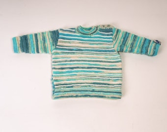 Handgestrickter Baby- oder Kleinkindpullover