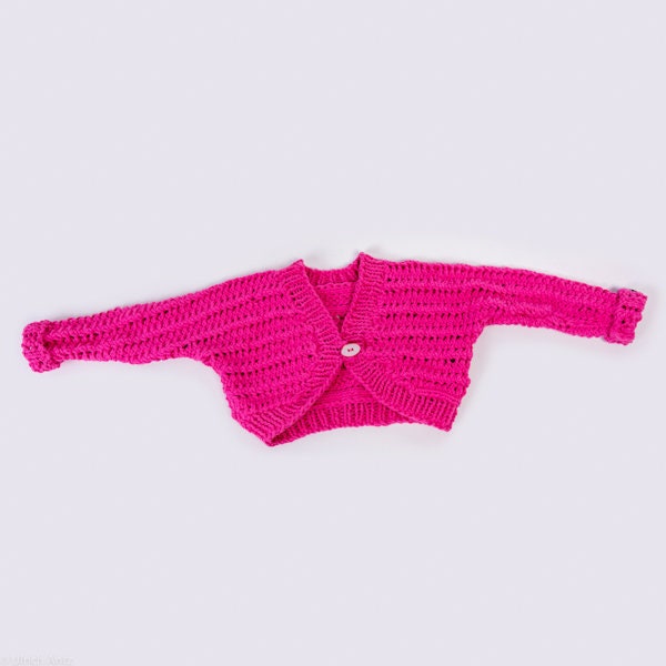 Hand-knitted bolero in lace pattern for children
