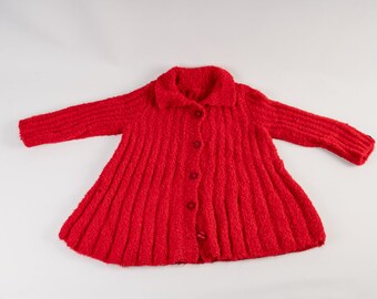 Manteau bébé ou tout-petit tricoté à la main