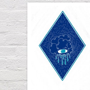 May include: A blue diamond-shaped design with a white background. Inside the diamond is a blue cloud with a blue eye and blue raindrops falling from it.