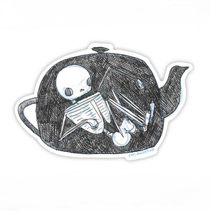 May include: A black and white illustration of a skeleton sitting inside a teapot. The teapot has a spout and a handle. The skeleton is holding a book and has a surprised expression on its face. The text "CAT.ROCKETBOY" is written at the bottom of the image.