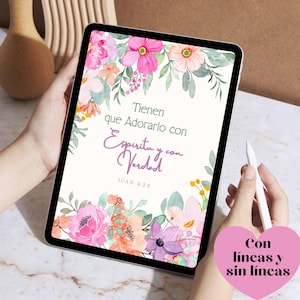 May include: A tablet displays a floral design with pink, purple, and orange flowers. The text reads "Tienen que Adorarlo con Espiritu y Verdad JUAN 4:24" and "Con líneas y sin líneas". A stylus is held near the screen.