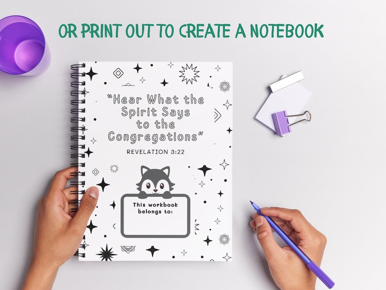 May include: A spiral-bound notebook with a black and white cover featuring the text "Hear What the Spirit Says to the Congregations" and a fox illustration. The notebook includes a space to write "This workbook belongs to:" and is accompanied by a purple pen.
