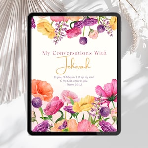 May include: A digital tablet shows a floral design with the text "My Conversations With Jehovah." The design features watercolour flowers in shades of pink, yellow, and purple, with the scripture Psalms 25:1,2.