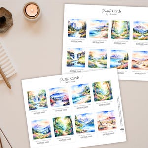 May include: Two sheets of printable cards featuring watercolor landscape paintings. Each card has a different scene, including mountains, waterfalls, and forests. The text "Printable Cards" and "spiritual need" are printed on the cards.