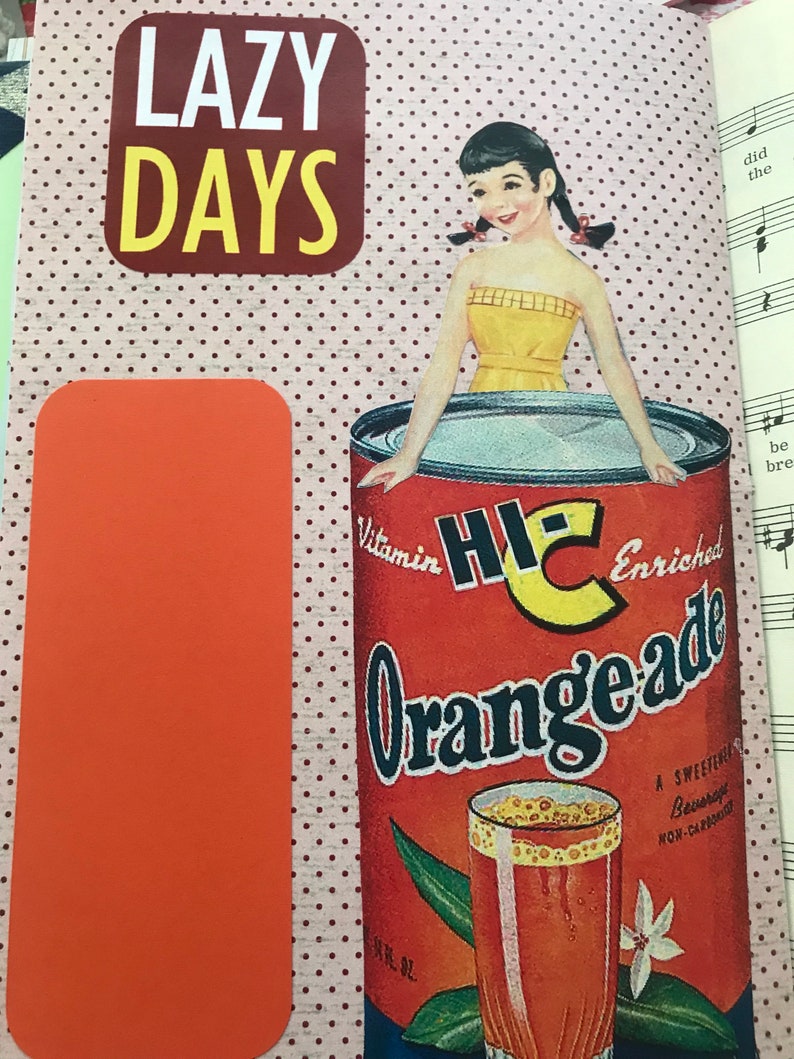May include: A vintage illustration of a can of orange soda with the words "Vitamin HE Enriched Orangeade" printed on the can. A woman in a yellow dress is sitting on top of the can. The background is a pink and white polka dot pattern.