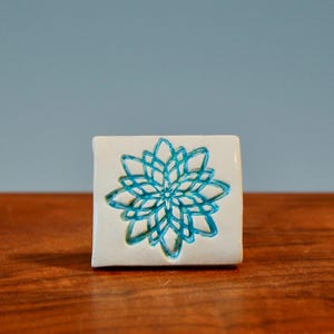 Turquoise Flower Stamped Magnet