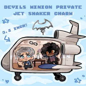 May include: A 3.5 inch Devils Minion Private Jet Shaker Charm featuring a cartoon illustration of a private jet with two characters inside, a small table, and a vase. A bat-shaped charm attachment is positioned above the jet cabin.