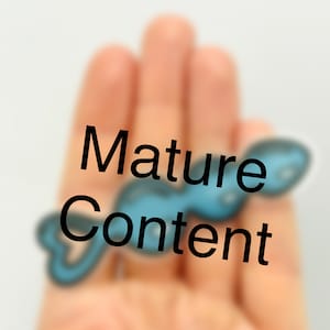 May include: A hand holding a blue and white object with the text "Mature Content" in black.
