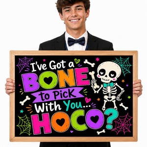 May include: A rectangular wooden sign with a black background featuring a cartoon skeleton and the colourful text I've Got a BONE to Pick With You... HOCO? The design includes neon spiderwebs, small bones, and hearts in pink, green, and blue.