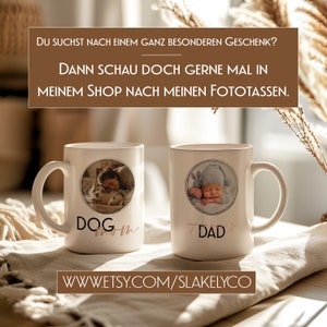 May include: Two white ceramic mugs with black outlines and a photo inside a circle. The mug on the left has a photo of a woman and a dog with the text "DOG mom" in brown and pink. The mug on the right has a photo of a baby with the text "DAD's" in brown and pink. The mugs are on a beige fabric surface with the text "WWW.ETSY.COM/SLAKELYCO" below.