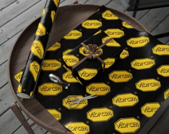 Vibram Yellow Lip Print Wrapping Paper | Black & Gold Patterned Gift Wrap