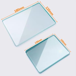 May include: Two rectangular glass plates, one measuring 180mm x 120mm and the other 130mm x 100mm. The plates are transparent with rounded corners, and are displayed against a light background. The dimensions are clearly labeled.