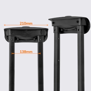 May include: Two black luggage handles with measurements. The top section is 210mm wide, and the base is 138mm wide. The handles are made of a sturdy material and are designed for durability.