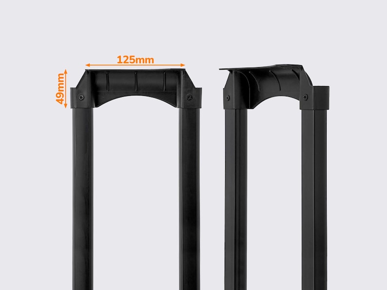 May include: Black luggage handle with a width of 125mm and a height of 49mm. The handle has a curved top with a textured grip for easy handling. The frame is made of a durable material, designed for travel.