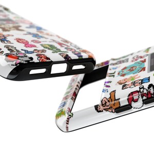 May include: Two white phone cases with a black border and a pixelated pattern of video game characters. The cases are shown from different angles.
