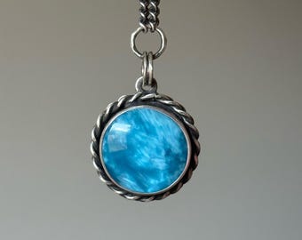 Pendentif en pierre à effet étoile