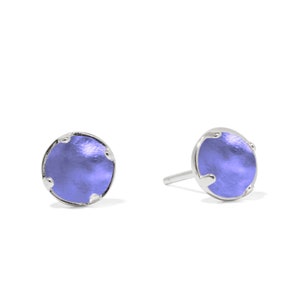 May include: A pair of silver stud earrings with a round, iridescent purple stone in the center.