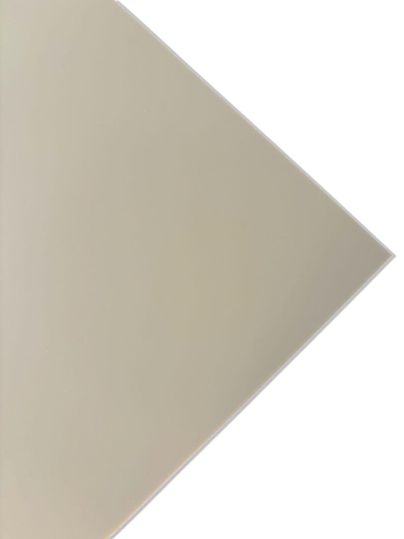 May include: A large sheet of off-white, smooth, textured paper.