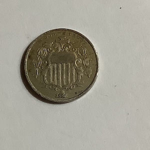 1868 Shield Nickel in XF condition.