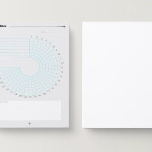 May include: Two white spiral-bound notebooks. One notebook has a teal habit tracker chart and the word "Habitos" at the top. The other notebook is blank. The notebooks are on a white background.