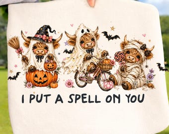 Diseño de camiseta de calabaza con diseño de vaca de las Tierras Altas para Halloween, lista para imprimir, con la frase "Te he hechizado, bruja, fantasma, momia, diseño de camiseta con calabaza".