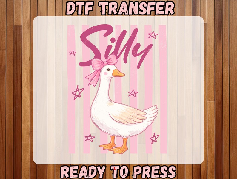May include: DTF transfer design featuring a cartoon goose with a pink bow and the word "Silly" in pink script. The background has pink stripes and stars. The text "READY TO PRESS" is at the bottom.