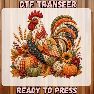 May include: A DTF TRANSFER READY TO PRESS graphic featuring a rooster with a patchwork-style pattern in shades of red, orange, blue, and green. The rooster is surrounded by autumn elements including pumpkins, wheat stalks, sunflowers, and fall leaves.