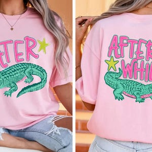 May include: Pink t-shirt with a teal alligator graphic and the word "LATER" in pink, with yellow and pink star accents. The back of the shirt has the words "AFTER WHILE" and a matching alligator graphic.