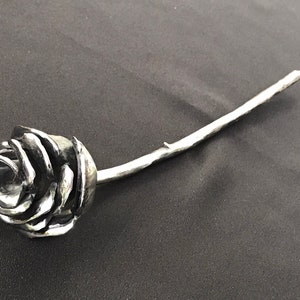 Rose, hand forged from a single piece of steel
