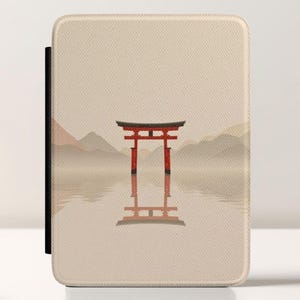 May include: A beige tablet case featuring a serene Japanese landscape with a red torii gate reflected in the water. The design includes mountains and a soft, neutral color palette. The case has a black border.