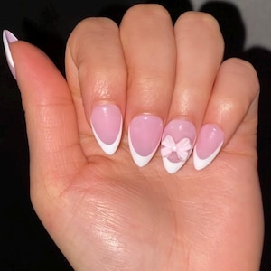 white nails / French tip nails / light pink base / coquette nails / light pink bow / press on nails / glue on nails / gel nails