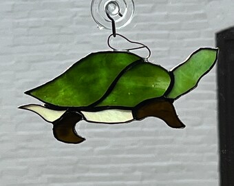 My Turtle stretches to the sky. A Stratozpheric Stained Glass Suncatcher