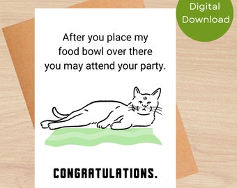 May include: A white card with black text and a black and white illustration of a cat lying on a green mat. The text reads "After you place my food bowl over there you may attend your party. Congratulations."