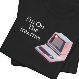 May include: Black t-shirt with a white graphic of a retro computer and the text "I'm On The Internet".
