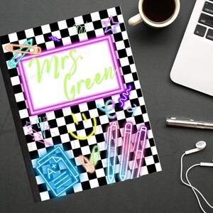 May include: Notebook with a black and white checkered pattern and neon-style illustrations. The notebook features the name "Mrs. Green" in green script within a pink and white frame. Additional neon elements include pencils, pens, and stars.