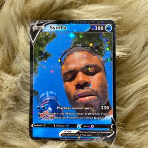 Symba Pokemon-Karte